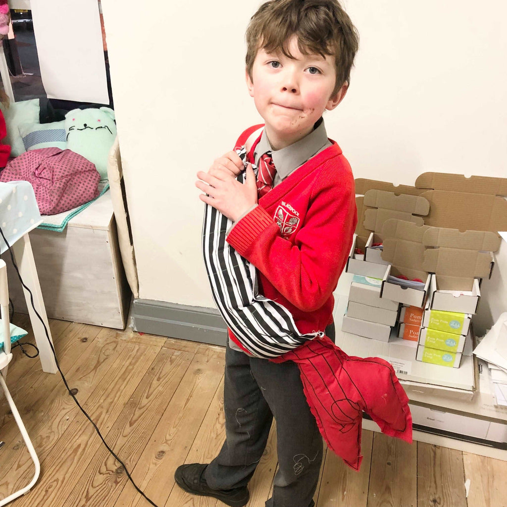 Home Education Stitch Club - little boy holding his stitched lobster!
