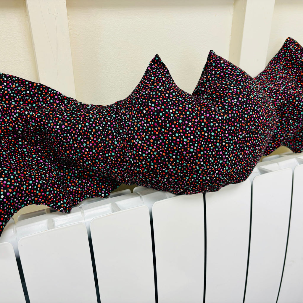 sew your own bat cushion - a polka dot bat cushion on a radiator