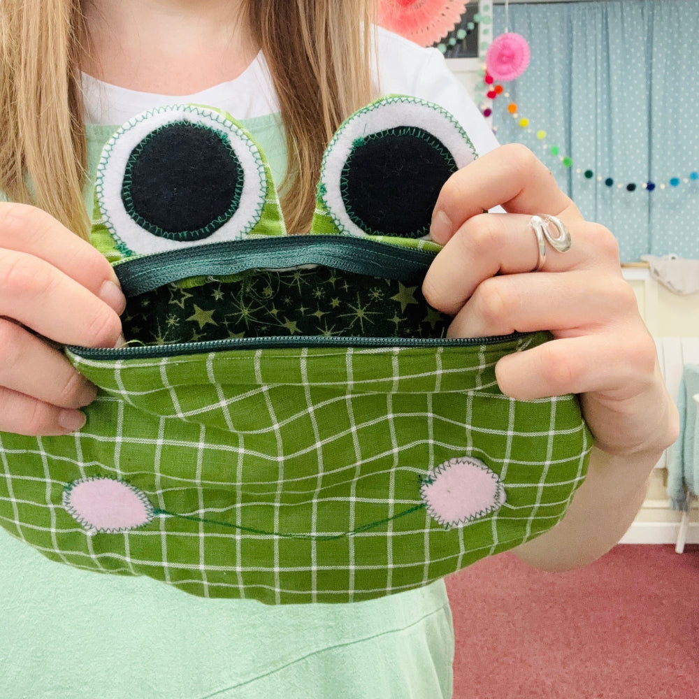 photo of frog pencil case in hands