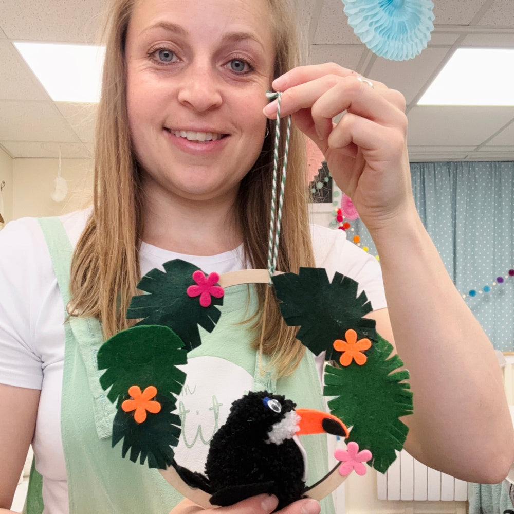 hoop with pom pom toucan felt leaves