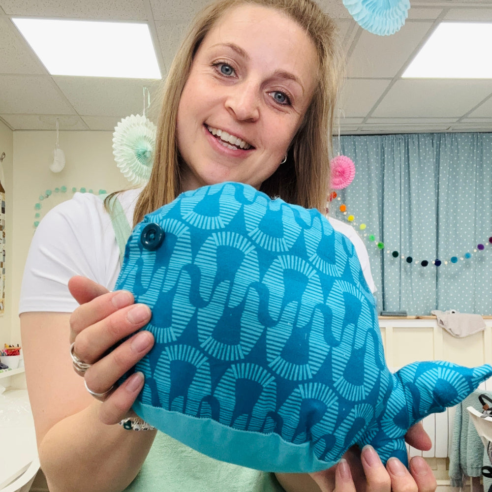 emma holding whale softie in hands