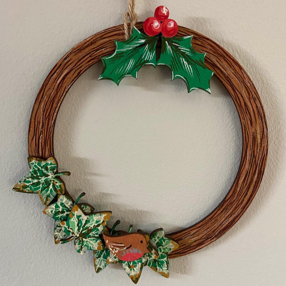 wooden wreath with robin, ivy and holly